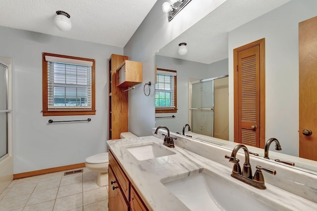 33 Edgewood Rd, Alexandria, TN 37012 - bathroom with an enclosed shower, tile patterned floors, double vanity, toilet, and baseboards