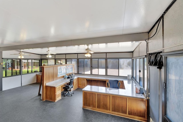 33 Edgewood Rd, Alexandria, TN 37012 - kitchen with an office area, a peninsula, a ceiling fan, brown cabinets, and light countertops