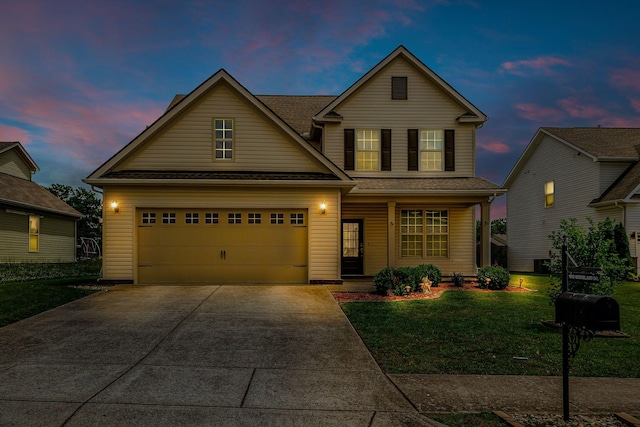 1010 Keeneland Dr, Spring Hill, TN 37174 - traditional-style house featuring a front yard, driveway, a garage, and covered porch