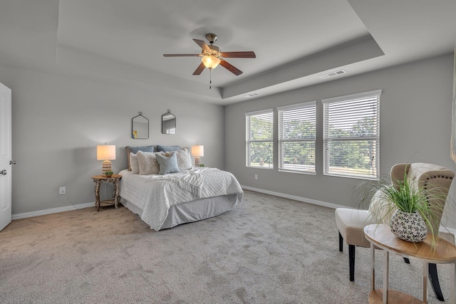 1010 Keeneland Dr, Spring Hill, TN 37174 - bedroom with a tray ceiling, baseboards, carpet floors, and a ceiling fan