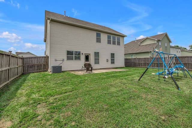 1010 Keeneland Dr, Spring Hill, TN 37174 - back of house with a playground, a patio, and cooling unit