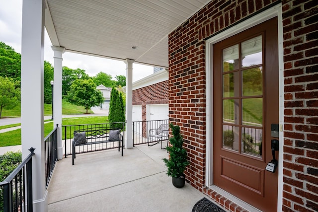 1820 Lanceford Ct, Franklin, TN 37067 - porch with concrete driveway and a garage