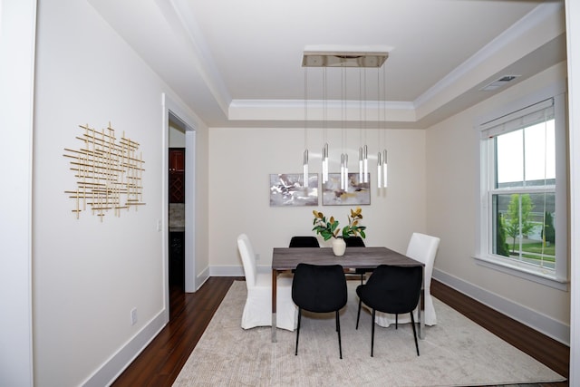 1820 Lanceford Ct, Franklin, TN 37067 - dining space with a tray ceiling, dark wood-type flooring, baseboards, and ornamental molding
