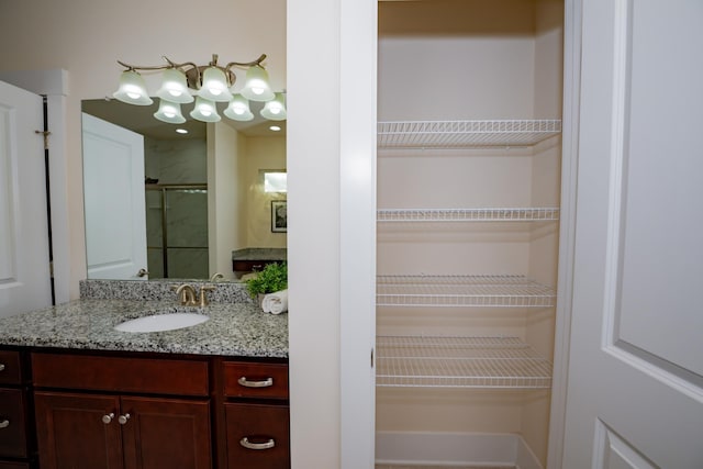 1820 Lanceford Ct, Franklin, TN 37067 - bathroom with a stall shower, vanity, and a closet