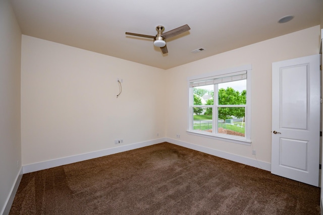 1820 Lanceford Ct, Franklin, TN 37067 - empty room featuring dark colored carpet, ceiling fan, and baseboards
