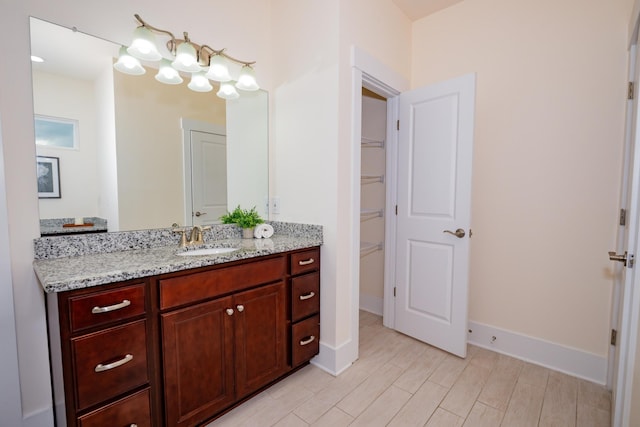 1820 Lanceford Ct, Franklin, TN 37067 - bathroom with vanity, a spacious closet, and baseboards