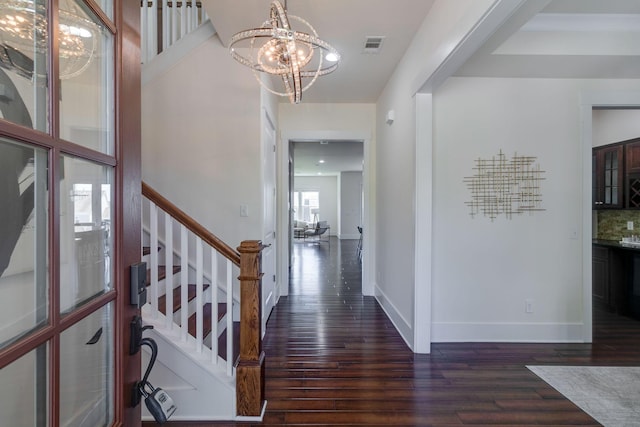 1820 Lanceford Ct, Franklin, TN 37067 - entryway with dark wood-style floors, a chandelier, stairs, and baseboards