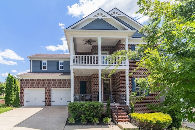 1820 Lanceford Ct, Franklin, TN 37067 - view of front of house with a balcony, brick siding, an attached garage, and driveway