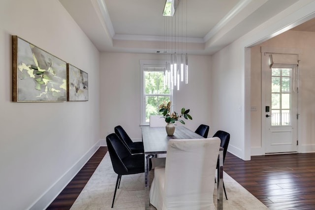 1820 Lanceford Ct, Franklin, TN 37067 - dining room with dark wood-type flooring, a tray ceiling, crown molding, and baseboards