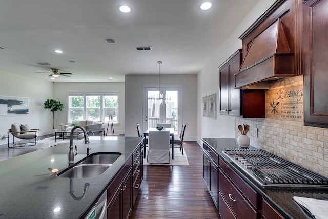 1820 Lanceford Ct, Franklin, TN 37067 - kitchen featuring a sink, premium range hood, appliances with stainless steel finishes, recessed lighting, and dark stone counters