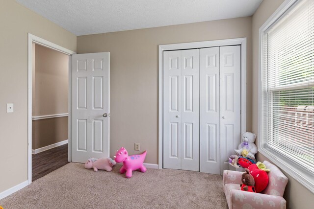 862 College St, Portland, TN 37148 - recreation room with carpet floors and baseboards