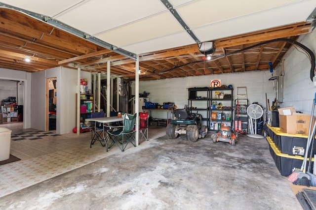 862 College St, Portland, TN 37148 - garage featuring concrete block wall