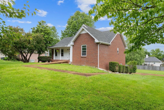 862 College St, Portland, TN 37148 - view of front of house with brick siding and roof with shingles