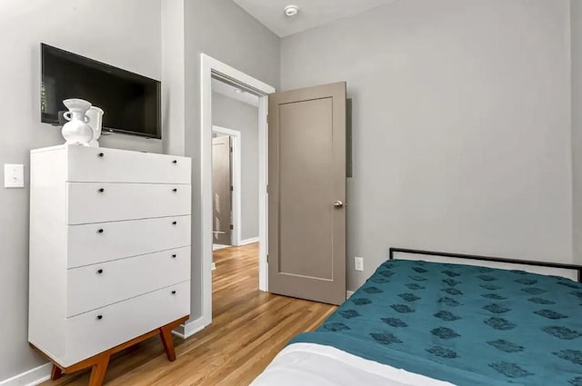 2120 Herman St Unit 2, Nashville, TN 37208 - bedroom with light wood-style flooring and baseboards