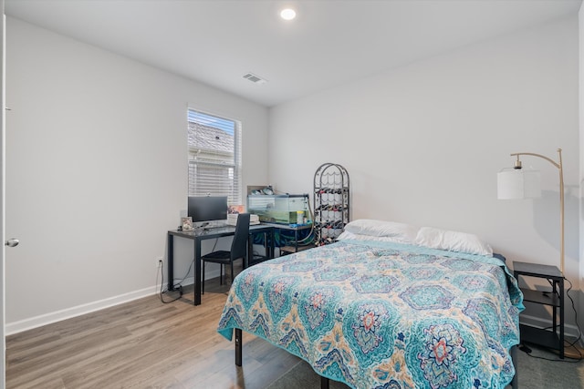 2405 Quinn Dr, White House, TN 37188 - bedroom with wood finished floors and baseboards