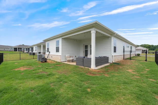 2405 Quinn Dr, White House, TN 37188 - rear view of property with outdoor lounge area, central air condition unit, a patio, and brick siding