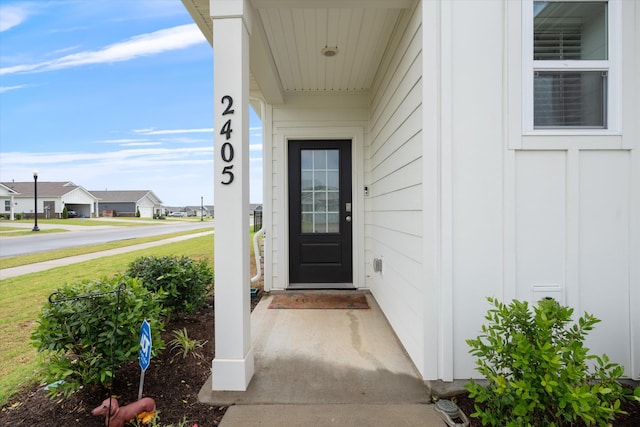 2405 Quinn Dr, White House, TN 37188 - property entrance featuring a residential view and a yard
