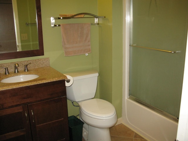 6225 Mount View Rd, Antioch, TN 37013 - bathroom featuring tile patterned flooring, toilet, vanity, and bath / shower combo with glass door