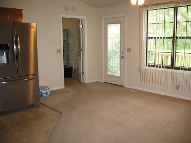 6225 Mount View Rd, Antioch, TN 37013 - unfurnished dining area with light colored carpet, baseboards, and a ceiling fan