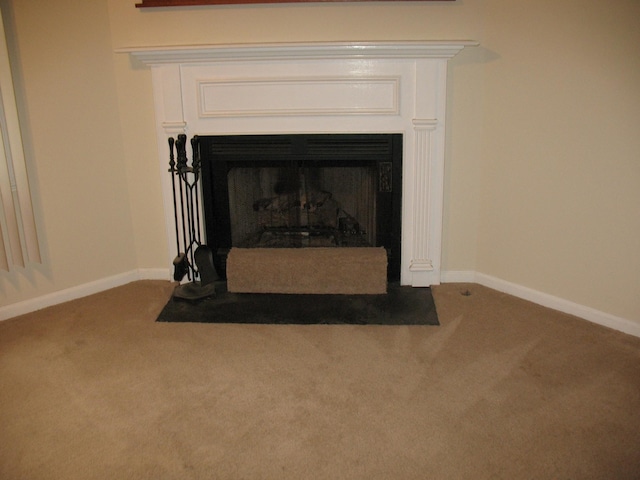 6225 Mount View Rd, Antioch, TN 37013 - detailed view of carpet flooring, a fireplace with flush hearth, and baseboards