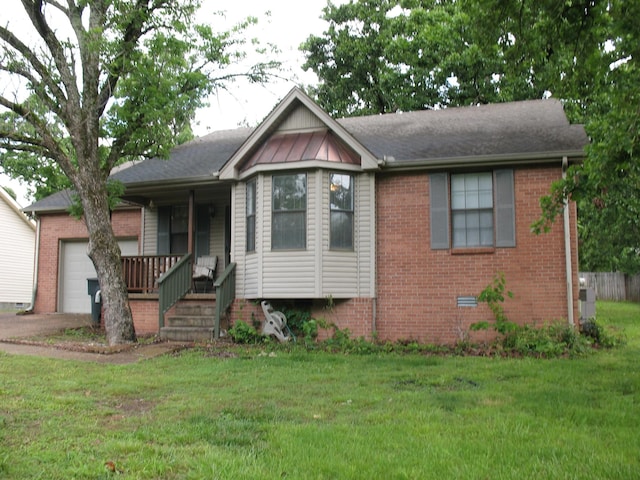 6225 Mount View Rd, Antioch, TN 37013 - ranch-style home featuring a garage, covered porch, a front yard, and brick siding