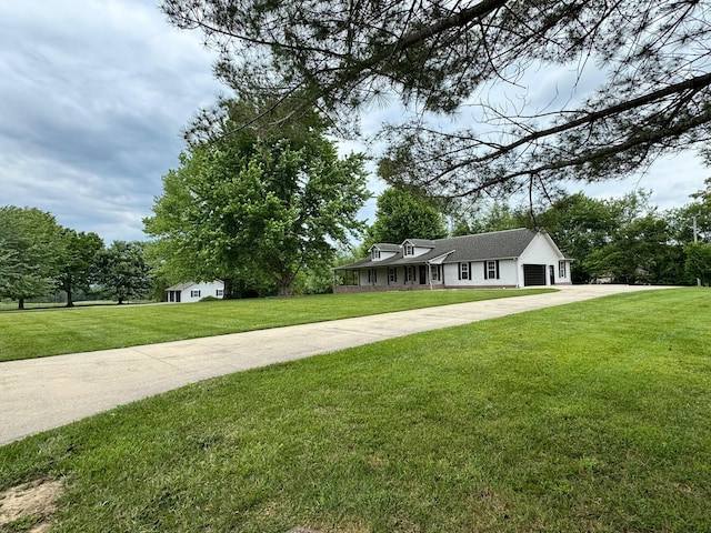 410 Sunset Ln, Monterey, TN 38574 - view of front of home featuring a front lawn, a garage, and concrete driveway