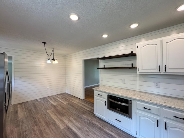 410 Sunset Ln, Monterey, TN 38574 - kitchen with a textured ceiling, stainless steel fridge with ice dispenser, open shelves, pendant lighting, and white cabinetry
