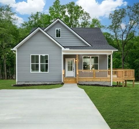 85 Truform Way, Dickson, TN 37055 - view of front facade featuring a front yard and a porch