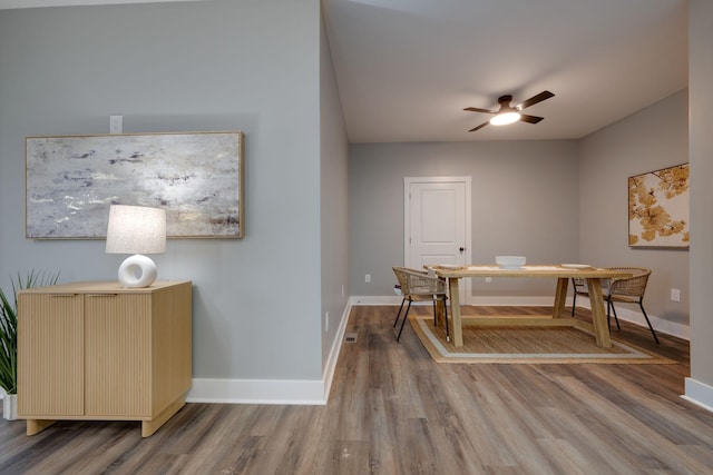 85 Truform Way, Dickson, TN 37055 - dining space with wood finished floors, a ceiling fan, and baseboards