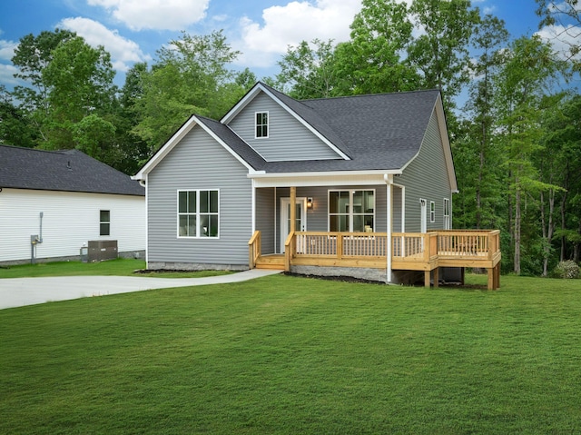 85 Truform Way, Dickson, TN 37055 - view of front of house featuring a front yard, central AC, and a shingled roof
