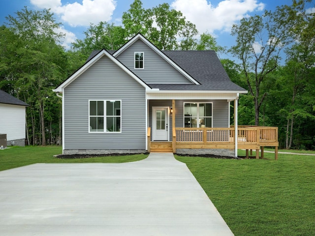 85 Truform Way, Dickson, TN 37055 - view of front facade with a front lawn, covered porch, and a shingled roof