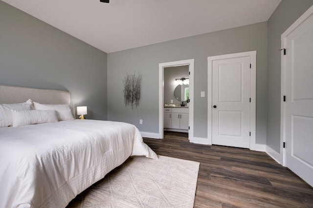 85 Truform Way, Dickson, TN 37055 - bedroom featuring dark wood-style flooring, baseboards, and ensuite bath