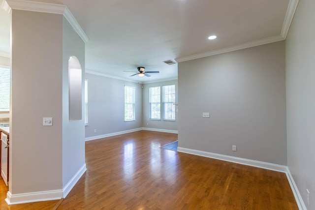 4316 Summercrest Blvd Unit 512, Antioch, TN 37013 - unfurnished room with ceiling fan, baseboards, wood finished floors, crown molding, and arched walkways
