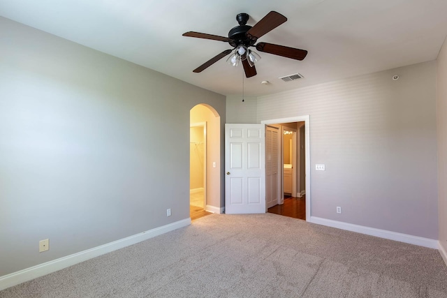 4316 Summercrest Blvd Unit 512, Antioch, TN 37013 - unfurnished bedroom with arched walkways, carpet flooring, baseboards, and ceiling fan