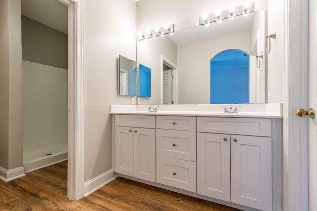 4316 Summercrest Blvd Unit 512, Antioch, TN 37013 - full bath with double vanity, wood finished floors, baseboards, and a walk in shower