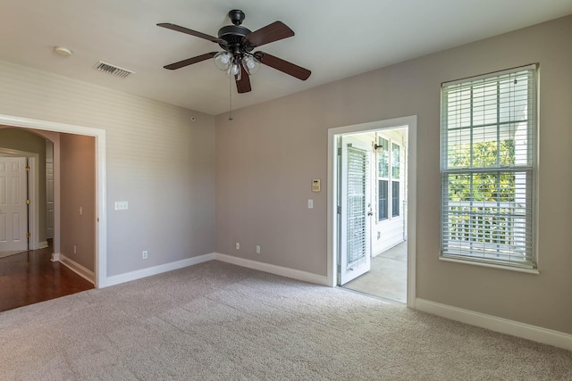4316 Summercrest Blvd Unit 512, Antioch, TN 37013 - carpeted spare room featuring baseboards, ceiling fan, arched walkways, and a smoke detector