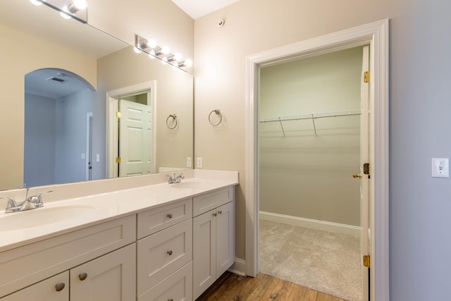 4316 Summercrest Blvd Unit 512, Antioch, TN 37013 - full bathroom featuring double vanity, wood finished floors, a spacious closet, and baseboards