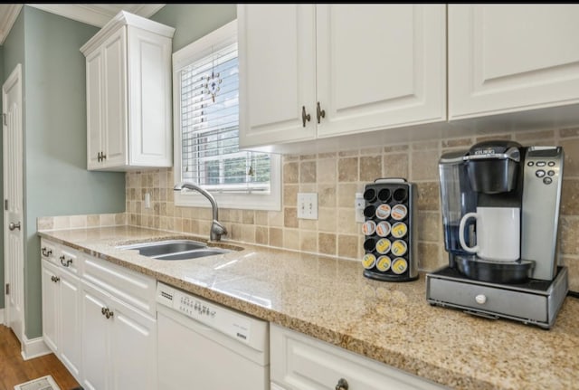 5122 Stonewood Dr, Smyrna, TN 37167 - kitchen featuring dishwasher, a sink, white cabinets, decorative backsplash, and light stone counters