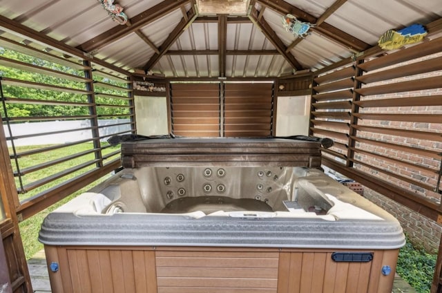 5122 Stonewood Dr, Smyrna, TN 37167 - sunroom featuring a hot tub and lofted ceiling
