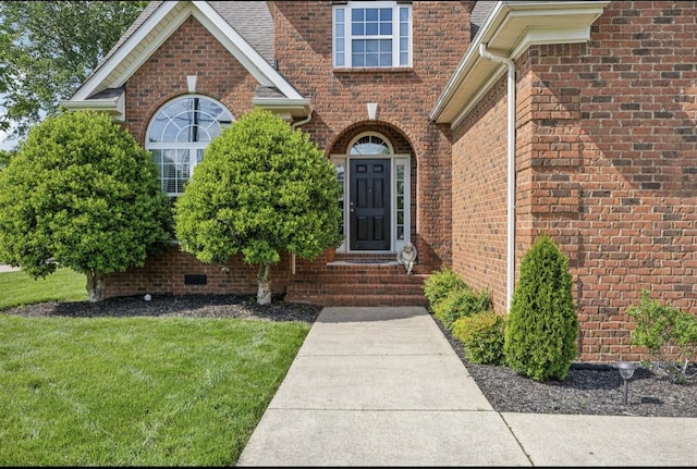 5122 Stonewood Dr, Smyrna, TN 37167 - property entrance featuring a lawn and brick siding