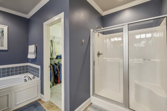 5122 Stonewood Dr, Smyrna, TN 37167 - bathroom featuring a stall shower, crown molding, a bath, a spacious closet, and tile patterned flooring