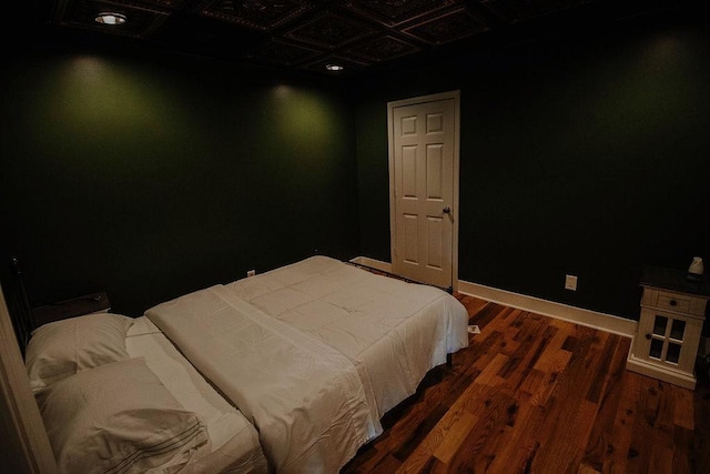 800 Riverside Dr, Columbia, TN 38401 - bedroom with dark wood-type flooring, an ornate ceiling, and baseboards