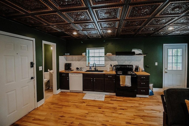800 Riverside Dr, Columbia, TN 38401 - kitchen featuring black electric range, white dishwasher, a sink, open shelves, and light wood finished floors