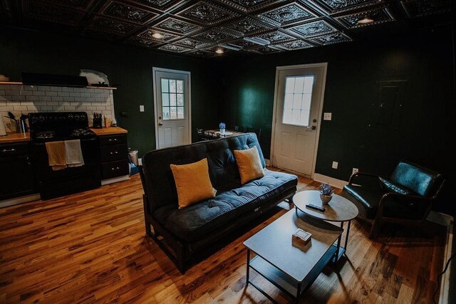 800 Riverside Dr, Columbia, TN 38401 - living room featuring an ornate ceiling, light wood-style flooring, and a brick fireplace