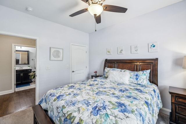 1420 Whispering Oaks Dr, Lebanon, TN 37090 - bedroom featuring dark wood finished floors, baseboards, ceiling fan, and a sink