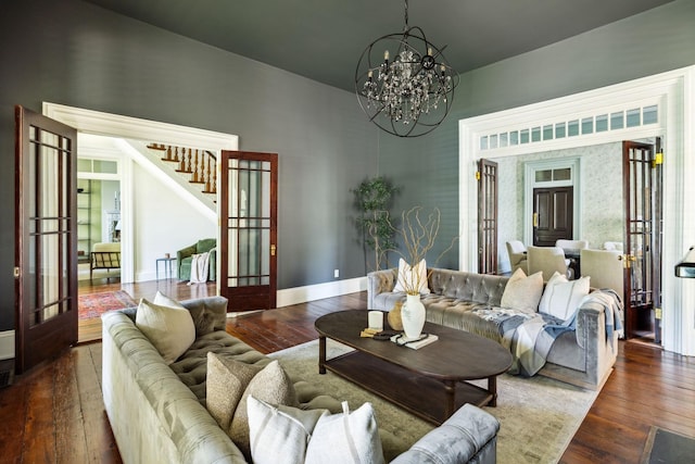 1051 W Main St, Franklin, TN 37064 - living area featuring hardwood / wood-style flooring, french doors, a chandelier, stairway, and a high ceiling