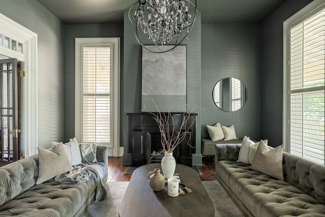 1051 W Main St, Franklin, TN 37064 - living area featuring a chandelier, wood finished floors, and plenty of natural light