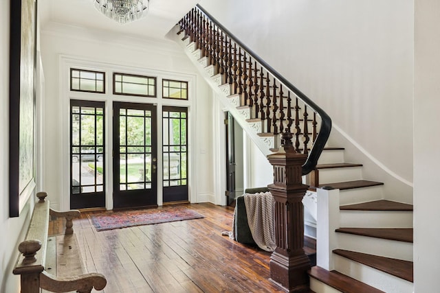 1051 W Main St, Franklin, TN 37064 - foyer entrance with stairway, hardwood / wood-style floors, a towering ceiling, and a chandelier