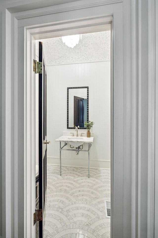 1051 W Main St, Franklin, TN 37064 - detailed view of baseboards and a sink
