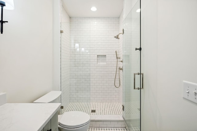 1051 W Main St, Franklin, TN 37064 - full bathroom with a stall shower, toilet, vanity, recessed lighting, and tile patterned flooring